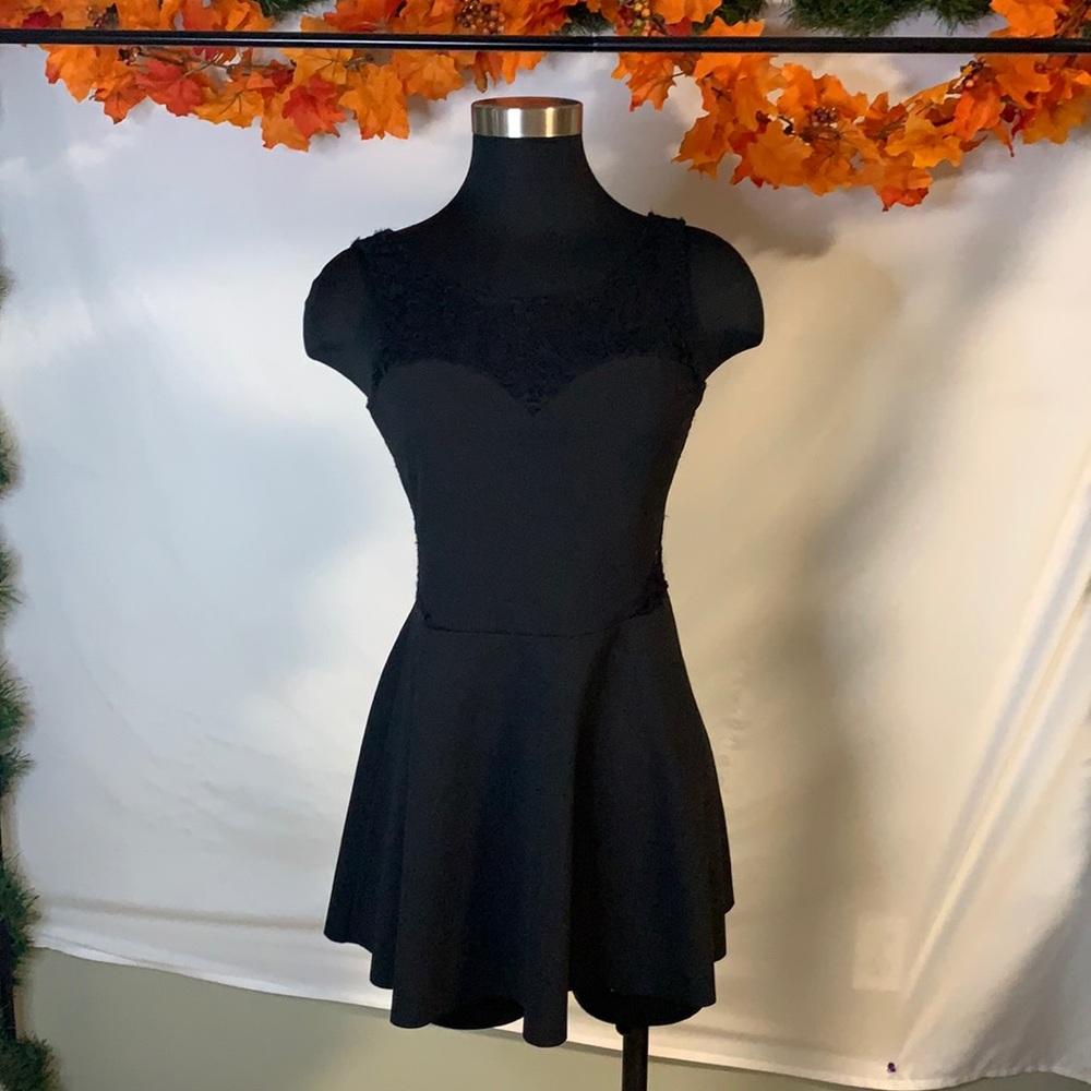 Black dress with lace detailing, made in Paris, size small